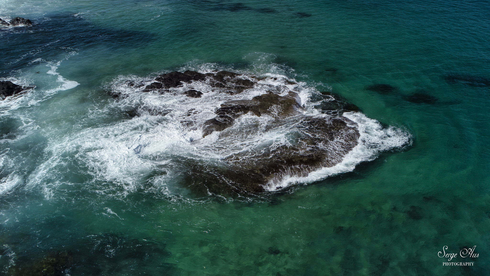 Pyramid Rock and the shipwreck remains
